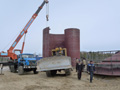 Tank construction at central processing facility